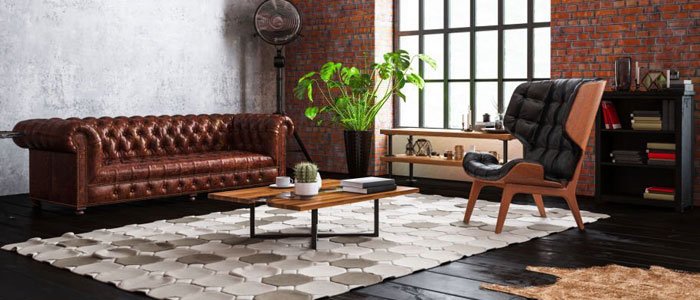 Mesa de centro de herrería en medio de una sala con piezas decorativas Mesa de centro de herrería en medio de una sala con piezas decorativas